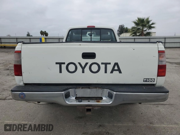 1997 Toyota T100 with VIN JT4JM11D9V0019752, listed as a Copart auction lot 82449524 with 279,981 mi miles and Salvage Title. Bid and sale history available at DreamBid. Image 6.