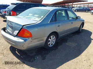 2001 Toyota Avalon XL z VIN 4T1BF28B31U150439, wystawiony jako IAAI lot #41868466 z przebiegiem 210 828 mil mil oraz . Historia ofert i sprzedaży dostępna na DreamBid. Obrazek 4.