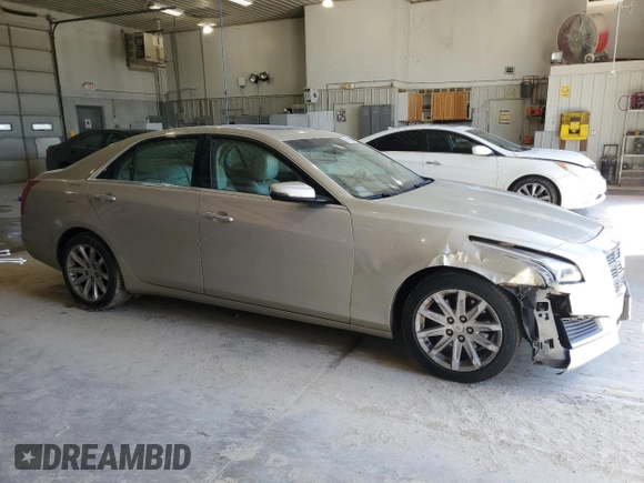 2014 Cadillac CTS Luxury AWD with VIN 1G6AX5S38E0130350, listed as a Copart auction lot 56565825 with 167,699 mi miles and Salvage title. Bid and sale history available at DreamBid. Image 4.