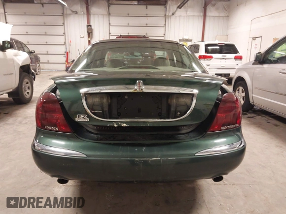 2001 Lincoln Continental with VIN 1LNHM97V11Y691910, listed as a IAAI auction lot 41501779 with 102,715 mi miles and . Bid and sale history available at DreamBid. Image 16.