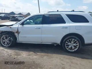 2014 Dodge Durango Citadel z VIN 1C4RDJEG9EC455930, wystawiony jako IAAI lot #42423167 z przebiegiem Nie podano mil oraz . Historia ofert i sprzedaży dostępna na DreamBid. Obrazek 13.
