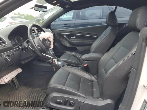 2013 Volkswagen Eos Komfort with VIN WVWBW8AH4DV001851, listed as a Copart auction lot 52132944 with 81,948 mi miles and Salvage Title. Bid and sale history available at DreamBid. Image 7.