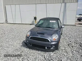 2012 MINI Convertible S with VIN WMWZP3C56CT250886, listed as a Copart auction lot 50027405 with 92,990 mi miles and Salvage title. Bid and sale history available at DreamBid. Image 13.
