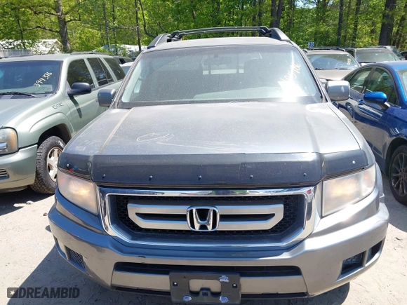 2009 Honda Ridgeline RTS with VIN 5FPYK16409B105186, listed as a IAAI auction lot 42003632 with 153,072 mi miles. Bid and sale history available at carsss.com. Image 11.