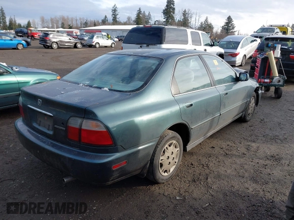 1997 Honda Accord Value with VIN 1HGCD5686VA189722, listed as a IAAI auction lot 41494380 with 205,514 mi miles and . Bid and sale history available at carsss.com. Image 4.