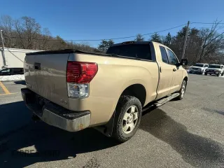 2010 Toyota Tundra 4WD Truck with VIN 5TFUM5F17AX015056, listed as a Copart auction lot 48601955 with 186,345 mi miles and Clean Title. Bid and sale history available at carsss.com. Image 4.