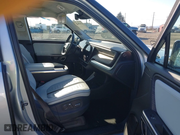 2023 Rivian R1T Adventure with VIN 7FCTGAAA0PN021864, listed as a IAAI auction lot 41620630 with 1 mi miles. Bid and sale history available at carsss.com. Image 5.