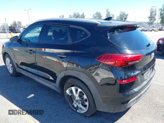 2021 Hyundai Tucson Value z VIN KM8J33A43MU306697, wystawiony jako IAAI lot #41869100 z przebiegiem 129 776 mil mil oraz . Historia ofert i sprzedaży dostępna na DreamBid. Obrazek 3.