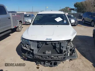 2018 Jeep Grand Cherokee Laredo E with VIN 1C4RJEAG2JC428990, listed as a IAAI auction lot 41218996 with 123,758 mi miles. Bid and sale history available at carsss.com. Image 13.