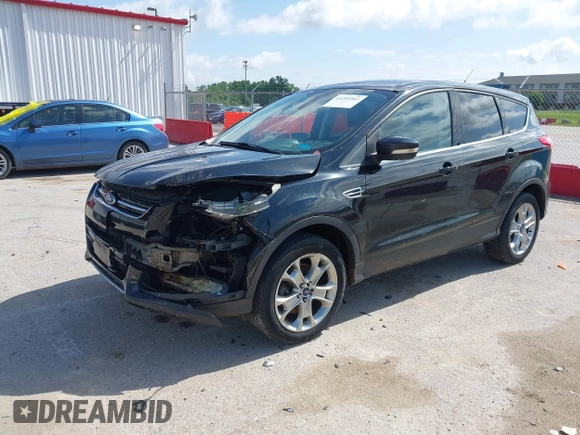 2013 Ford Escape SEL with VIN 1FMCU9HX1DUB97939, listed as a IAAI auction lot 42293561 with 196,951 mi miles and . Bid and sale history available at DreamBid. Image 18.
