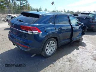 2022 Volkswagen Atlas SE z VIN 1V2HE2CA4NC220203, wystawiony jako IAAI lot #41982896 z przebiegiem 61 989 mil mil oraz . Historia ofert i sprzedaży dostępna na DreamBid. Obrazek 4.