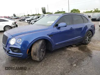 2020 Bentley Bentayga V8 z VIN SJAAM2ZV4LC029380, wystawiony jako Copart lot #61638873 z przebiegiem 7979 mil mil oraz . Historia ofert i sprzedaży dostępna na DreamBid. Obrazek 1.