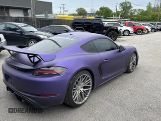 2018 Porsche 718 Cayman S with VIN WP0AB2A8XJK279655, listed as a Copart auction lot 55249845 with 59,283 mi miles and Clean Title. Bid and sale history available at DreamBid. Image 4.