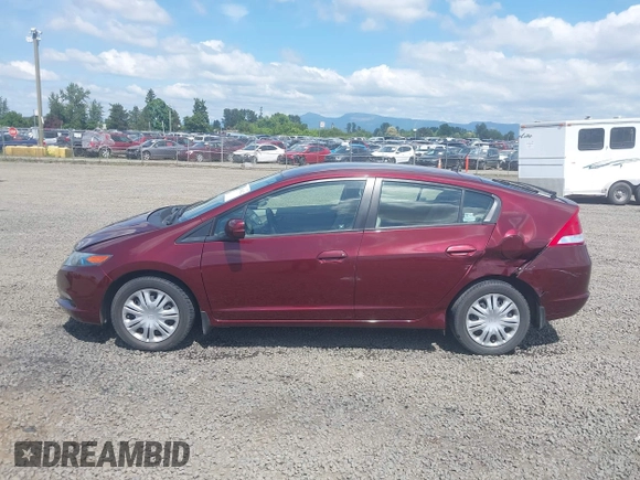 2011 Honda Insight LX z VIN JHMZE2H51BS004312, wystawiony jako IAAI lot #42086422 z przebiegiem 72 814 mil mil oraz . Historia ofert i sprzedaży dostępna na DreamBid. Obrazek 14.
