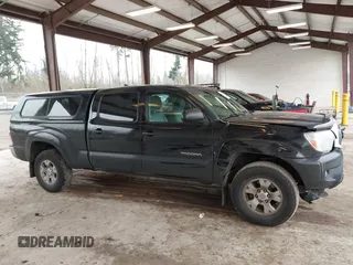 2015 Toyota Tacoma with VIN 3TMMU4FN1FM086408, listed as a IAAI auction lot 41320197 with 161,356 mi miles and . Bid and sale history available at DreamBid. Image 13.