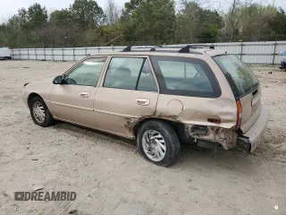 1999 Ford Escort SE with VIN 3FAFP15P0XR167167, listed as a Copart auction lot 52094765 with 154,960 mi miles and Salvage Title. Bid and sale history available at carsss.com. Image 2.