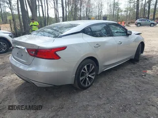2016 Nissan Maxima SL with VIN 1N4AA6AP9GC406406, listed as a IAAI auction lot 41954790 with 139,380 mi miles and . Bid and sale history available at DreamBid. Image 4.