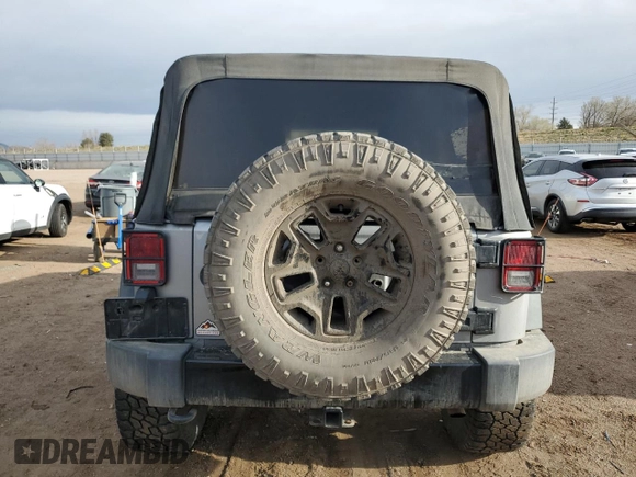 2015 Jeep Wrangler Unlimited Willys Wheeler with VIN 1C4BJWDG7FL690952, listed as a Copart auction lot 51493715 with 45,497 mi miles and Salvage Title. Bid and sale history available at DreamBid. Image 6.