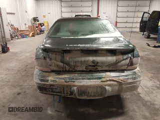 1997 Pontiac Bonneville SE z VIN 1G2HX52KXVH250272, wystawiony jako IAAI lot #41644041 z przebiegiem 160 791 mil mil oraz . Historia ofert i sprzedaży dostępna na DreamBid. Obrazek 17.