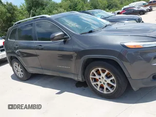 2016 Jeep Cherokee Latitude with VIN 1C4PJLCBXGW265431, listed as a IAAI auction lot 42542328 with 127,249 mi miles and . Bid and sale history available at DreamBid. Image 13.