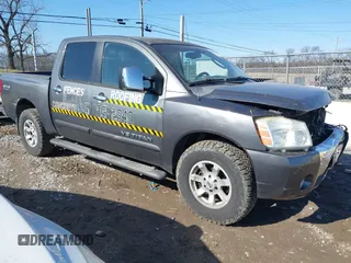 2005 Nissan Titan SE with VIN 1N6BA07B15N569959, listed as a IAAI auction lot 41389671 with 188,335 mi miles. Bid and sale history available at carsss.com. Image 1.