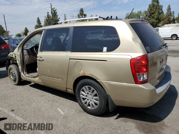 2011 Kia Sedona LX with VIN KNDMG4C75B6372298, listed as a Copart auction lot 62143844 with 180,287 mi miles and Salvage Title. Bid and sale history available at carsss.com. Image 2.