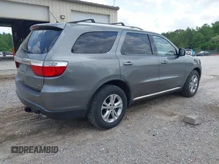 2012 Dodge Durango Crew with VIN 1C4RDJDG7CC112628, listed as a IAAI auction lot 42167214 with 144,898 mi miles and . Bid and sale history available at carsss.com. Image 4.
