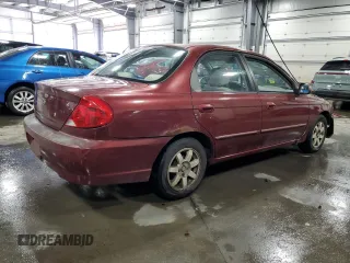 2003 Kia Spectra with VIN KNAFB121735217341, listed as a Copart auction lot 72016504 with 116,224 mi miles and Salvage Title. Bid and sale history available at DreamBid. Image 3.