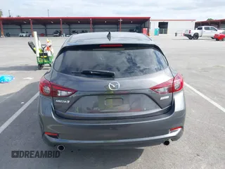 2018 Mazda 3 Touring with VIN 3MZBN1L32JM268582, listed as a IAAI auction lot 42072435 with 61,417 mi miles. Bid and sale history available at carsss.com. Image 16.