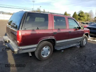1999 GMC Yukon with VIN 1GKEK13R2XJ728279, listed as a Copart auction lot 84099064 with 162,131 mi miles and Clean Title. Bid and sale history available at carsss.com. Image 3.