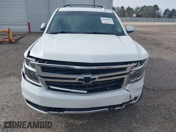 2017 Chevrolet Tahoe LT with VIN 1GNSKBKCXHR350028, listed as a IAAI auction lot 41684954 with 117,261 mi miles and . Bid and sale history available at DreamBid. Image 13.