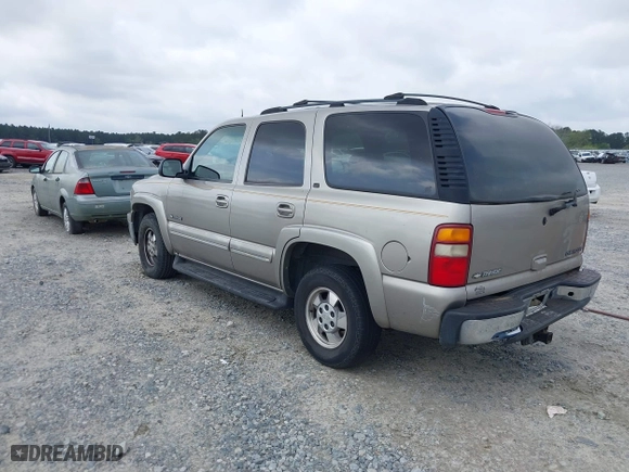 2002 Chevrolet Tahoe LT with VIN 1GNEC13Z82R273092, listed as a IAAI auction lot 41927418 with 230,416 mi miles. Bid and sale history available at carsss.com. Image 3.
