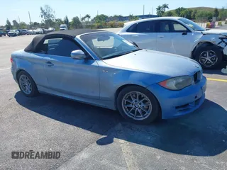 2011 BMW 1 Series 128i with VIN WBAUL7C52BVM80067, listed as a IAAI auction lot 41848583 with 94,825 mi miles and . Bid and sale history available at carsss.com. Image 1.