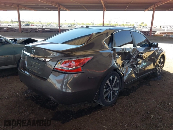 2015 Nissan Altima SL z VIN 1N4AL3AP0FC233740, wystawiony jako IAAI lot #42239684 z przebiegiem 111 970 mil mil oraz . Historia ofert i sprzedaży dostępna na DreamBid. Obrazek 4.