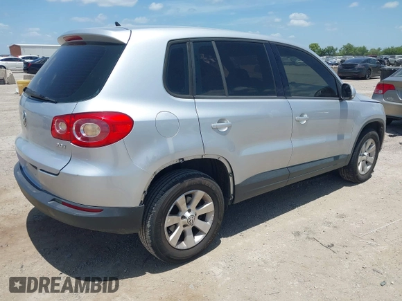 2010 Volkswagen Tiguan S with VIN WVGAV7AX5AW002380, listed as a IAAI auction lot 42604662 with 124,841 mi miles and . Bid and sale history available at DreamBid. Image 4.