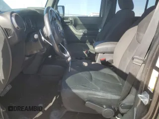 2018 Jeep Wrangler JK Unlimited Sport S with VIN 1C4BJWDG3JL822565, listed as a Copart auction lot 47125535 with 77,164 mi miles and Salvage Title. Bid and sale history available at carsss.com. Image 7.