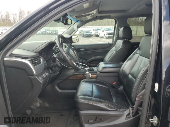 2015 Chevrolet Suburban LT with VIN 1GNSKJKC9FR510682, listed as a Copart auction lot 55427315 with 202,592 mi miles and Salvage Title. Bid and sale history available at DreamBid. Image 7.