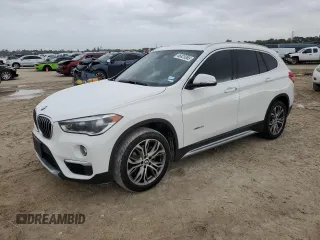 2017 BMW X1 xDrive28i z VIN WBXHT3Z34H4A57322, wystawiony jako Copart lot #46825065 z przebiegiem 76 206 mil mil oraz Czysty tytuł • Clean title. Historia ofert i sprzedaży dostępna na DreamBid. Obrazek 1.