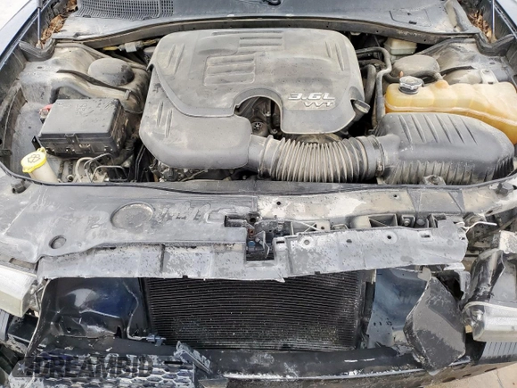 2014 Dodge Charger SE with VIN 2C3CDXBG2EH168511, listed as a Copart auction lot 55286265 with 210,600 mi miles and Salvage Title. Bid and sale history available at DreamBid. Image 11.