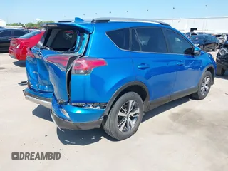 2018 Toyota RAV4 XLE with VIN JTMWFREV2JJ168557, listed as a IAAI auction lot 41994837 with 107,636 mi miles. Bid and sale history available at carsss.com. Image 4.