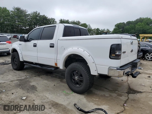 2004 Ford F-150 XLT with VIN 1FTPW14534KD15619, listed as a Copart auction lot 60589845 with 151,793 mi miles and Salvage title. Bid and sale history available at DreamBid. Image 2.