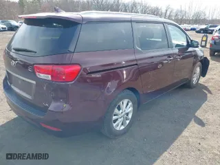 2017 Kia Sedona LX with VIN KNDMB5C16H6328514, listed as a IAAI auction lot 41833571 with 131,617 mi miles. Bid and sale history available at carsss.com. Image 4.