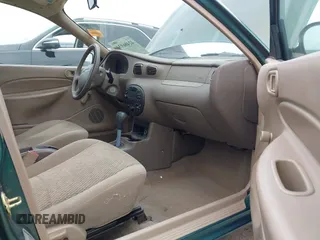 1999 Ford Escort LX z VIN 1FAFP10P1XW230023, wystawiony jako IAAI lot #42486934 z przebiegiem 41 468 mil mil oraz . Historia ofert i sprzedaży dostępna na DreamBid. Obrazek 5.