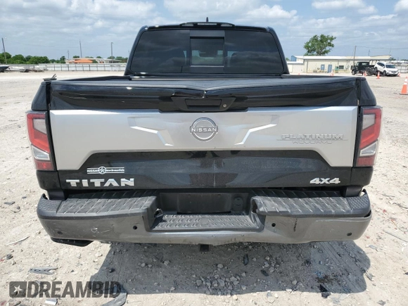2023 Nissan Titan Platinum Reserve with VIN 1N6AA1EDXPN106467, listed as a Copart auction lot 53455215 with 56,061 mi miles and Salvage title. Bid and sale history available at DreamBid. Image 6.