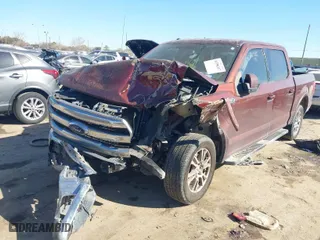 2015 Ford F-150 XL with VIN 1FTEW1CF1FKE58928, listed as a IAAI auction lot 41396317 with 233,089 mi miles. Bid and sale history available at carsss.com. Image 2.