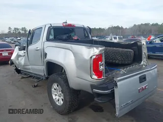 2016 GMC Canyon 2WD SLE with VIN 1GTG5CE34G1252553, listed as a IAAI auction lot 41609585 with 128,720 mi miles. Bid and sale history available at carsss.com. Image 3.
