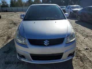2011 Suzuki SX4 Sportback with VIN JS2YA5A51B6300658, listed as a Copart auction lot 87456604 with 190,950 mi miles and Salvage Title. Bid and sale history available at carsss.com. Image 5.