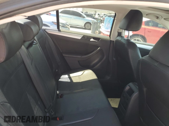 2013 Volkswagen Jetta SE z VIN 3VWDX7AJXDM235339, wystawiony jako Copart lot #52751345 z przebiegiem 143 478 mil mil oraz Szkoda całkowita • Salvage title. Historia ofert i sprzedaży dostępna na DreamBid. Obrazek 10.