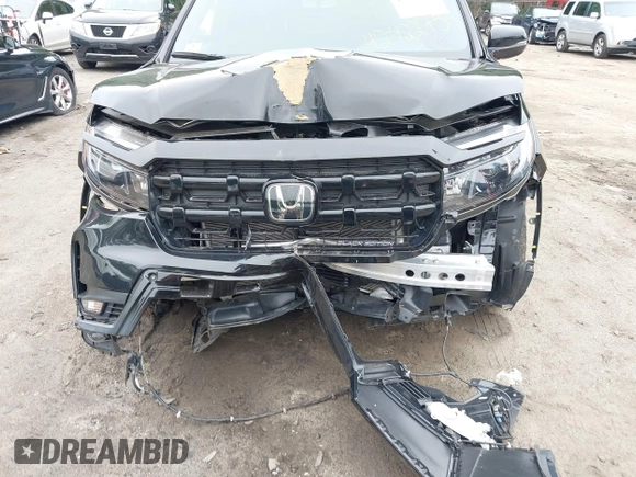 2024 Honda Ridgeline Black Edition with VIN 5FPYK3F83RB012452, listed as a IAAI auction lot 42422754 with 26,475 mi miles and . Bid and sale history available at DreamBid. Image 6.