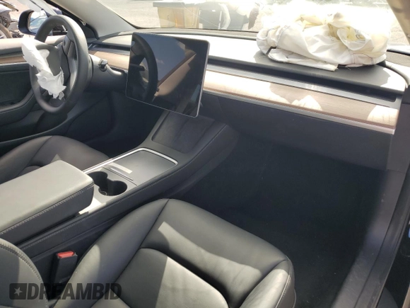 2023 Tesla Model 3 z VIN 5YJ3E1EA3PF713735, wystawiony jako Copart lot #51821995 z przebiegiem Nie podano mil oraz Szkoda całkowita • Salvage title. Historia ofert i sprzedaży dostępna na DreamBid. Obrazek 8.